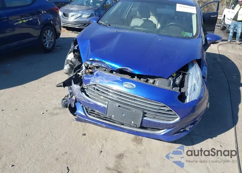 2014 Ford Fiesta Titanium z USA, uszkodzony, nr VIN 3FADP4FJ3EM176698